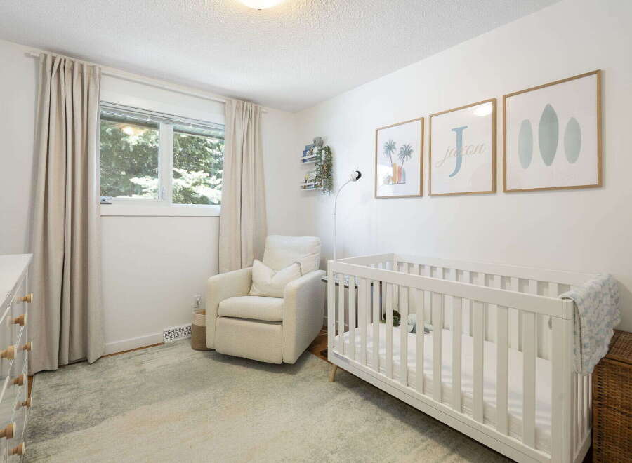 Welcome to this charming nursery, thoughtfully designed for comfort and style.