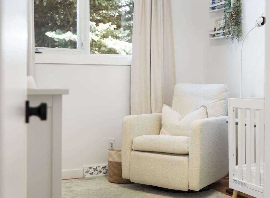 Create a serene nursery with this comfortable armchair, perfect for late-night feedings and quiet moments.