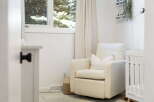 Create a serene nursery with this comfortable armchair, perfect for late-night feedings and quiet moments.