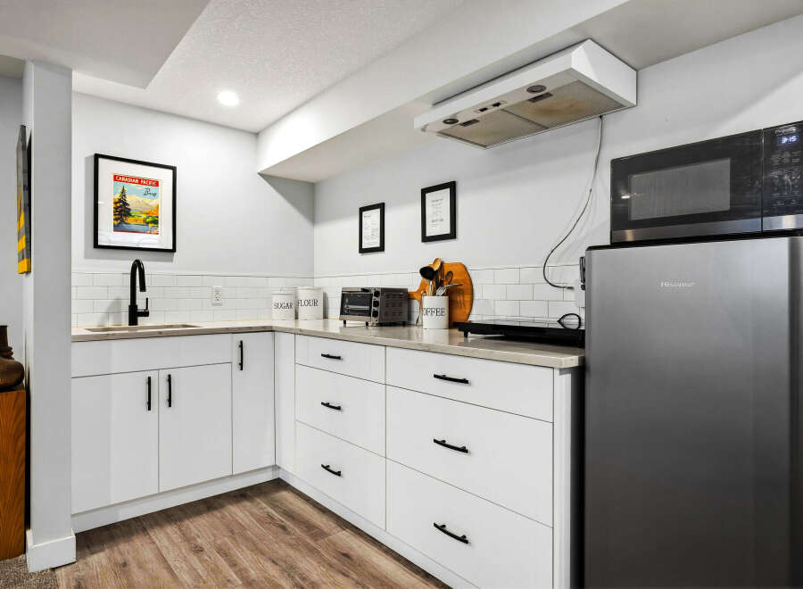 Discover this charming kitchenette, perfect for any home.