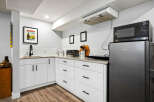 Discover this charming kitchenette, perfect for any home.