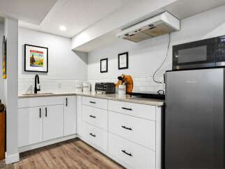 Discover this charming kitchenette, perfect for any home.