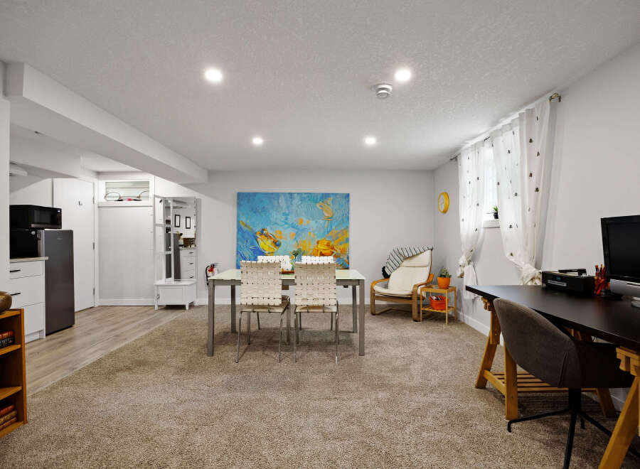This versatile basement space offers a functional layout perfect for modern living.