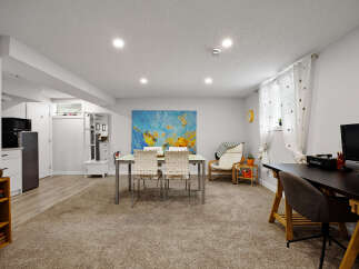 This versatile basement space offers a functional layout perfect for modern living.