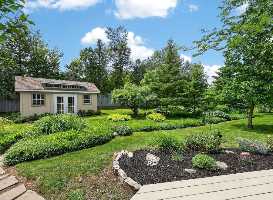 Discover this charming backyard oasis, perfect for relaxation and entertaining.