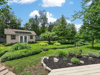 Discover this charming backyard oasis, perfect for relaxation and entertaining.