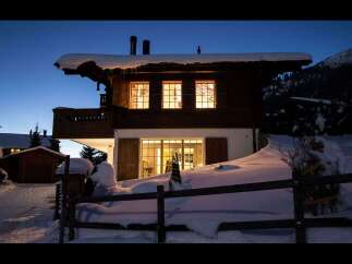Experience the magic of winter in this charming alpine chalet, nestled amidst snow-covered landscapes.