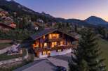 Experience luxury mountain living in this stunning chalet, nestled amidst the picturesque Swiss Alps.