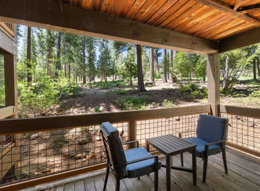Enjoy the serene mountain views from this charming deck, perfect for morning coffee or evening relaxation.