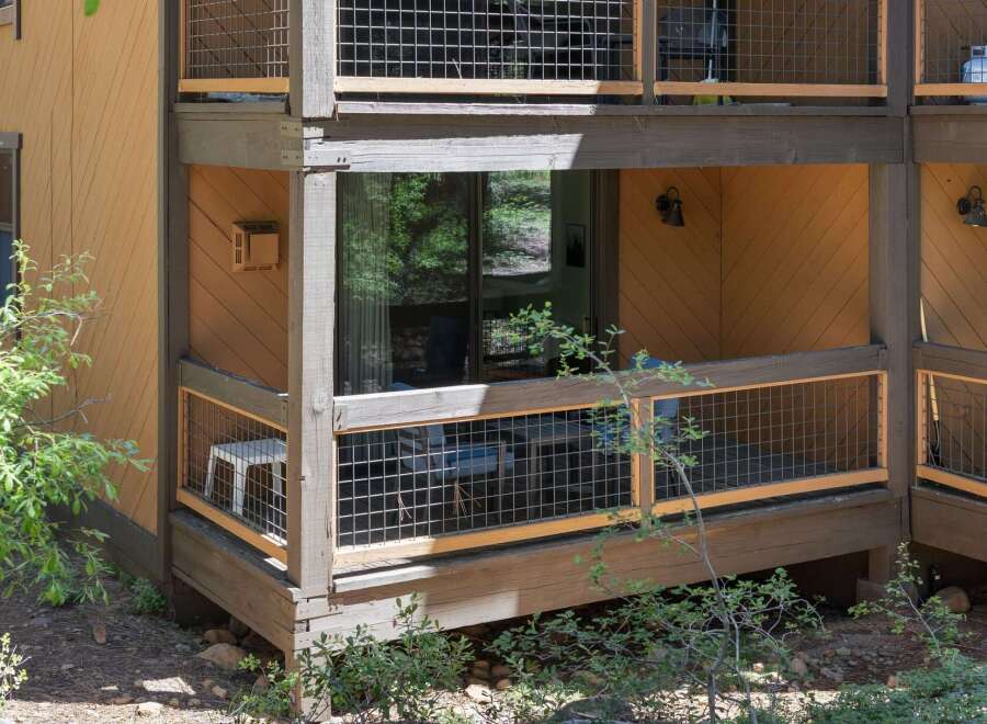 Enjoy the outdoors from this charming balcony, perfect for morning coffee or evening relaxation.