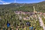Nestled amidst a dense pine forest, this property offers a unique mountain retreat with stunning views of the ski slopes.