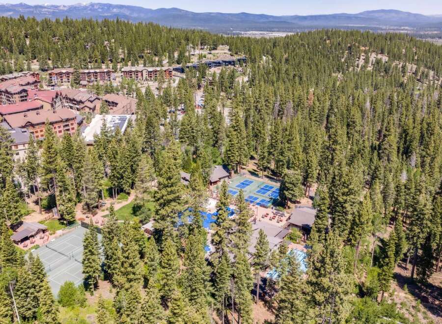 Discover this stunning mountain resort featuring multiple tennis and pickleball courts, perfect for active lifestyles.