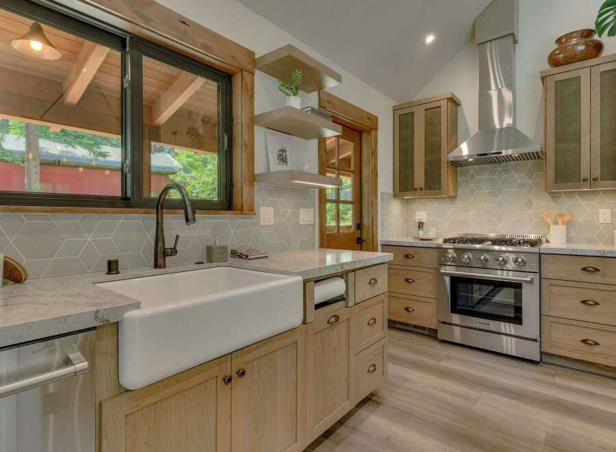 Experience rustic charm and modern convenience in this beautifully appointed kitchen.