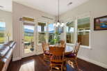 Enjoy breathtaking mountain views from this charming dining area, perfect for intimate meals or lively gatherings.
