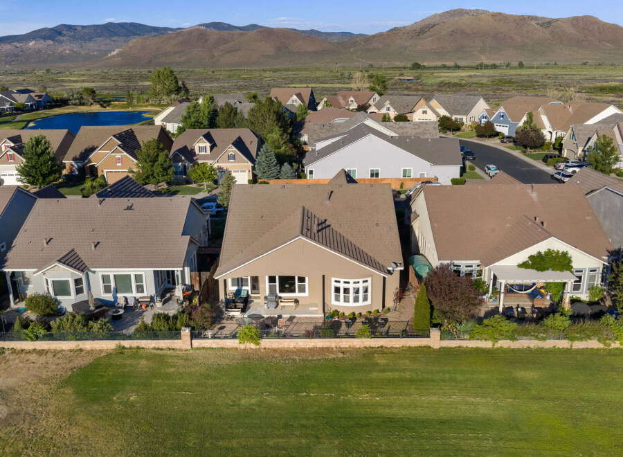 Discover this stunning property featuring a beautifully landscaped backyard with a patio, perfect for outdoor entertaining.