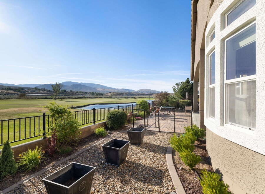 Enjoy stunning golf course and water views from this beautiful property.