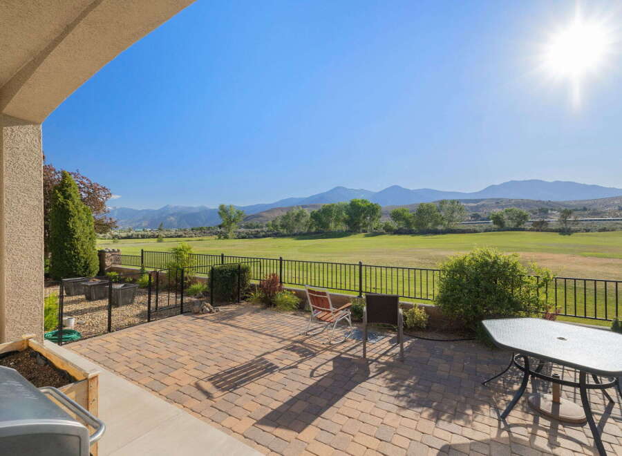 Enjoy breathtaking mountain views from this stunning patio, perfect for outdoor entertaining.