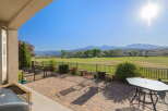 Enjoy breathtaking mountain views from this stunning patio, perfect for outdoor entertaining.
