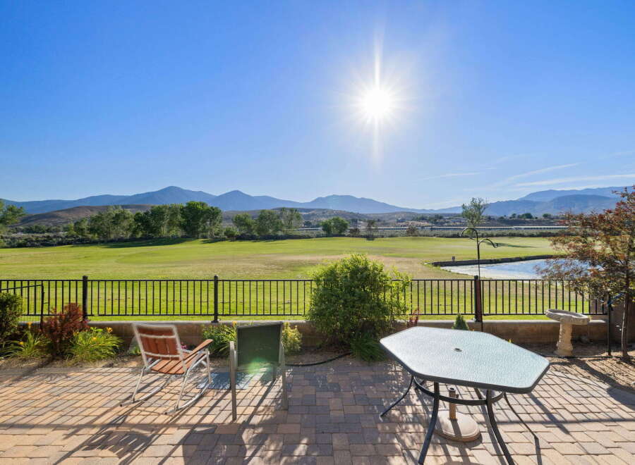 Enjoy breathtaking mountain views and a pristine golf course from this stunning patio.