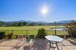 Enjoy breathtaking mountain views and a pristine golf course from this stunning patio.