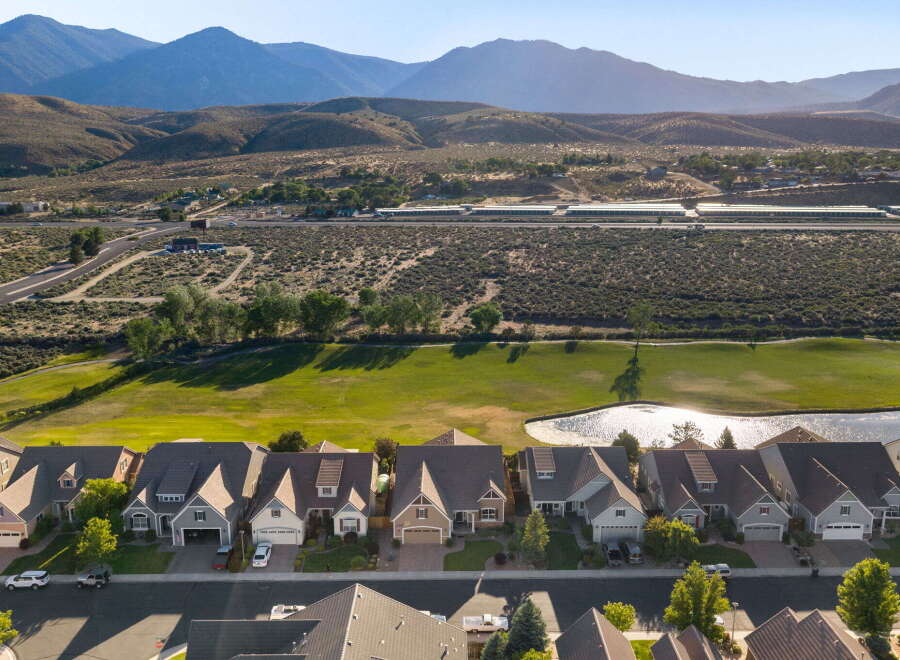 Discover this stunning suburban neighborhood with picturesque mountain views and a serene golf course.