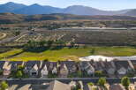 Discover this stunning suburban neighborhood with picturesque mountain views and a serene golf course.