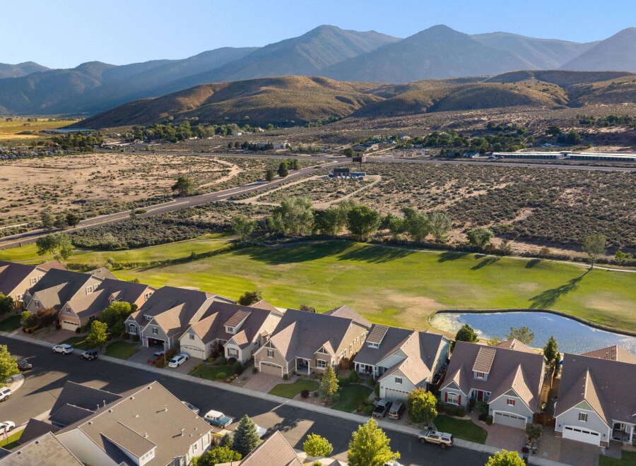 Discover this stunning suburban neighborhood featuring modern homes with beautiful landscaping and scenic mountain views.