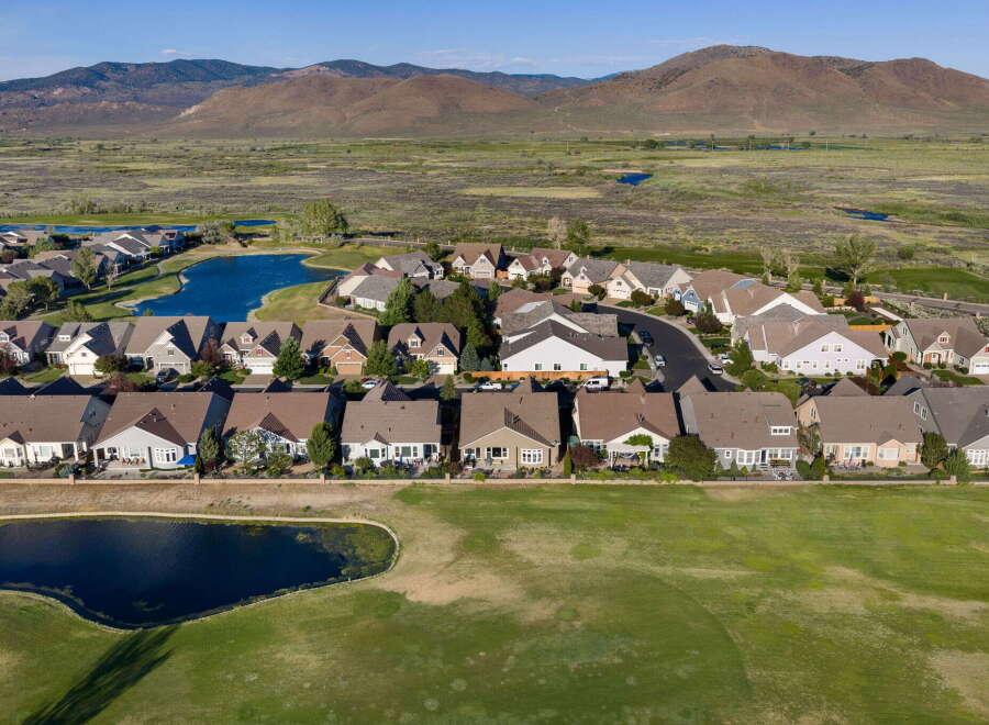 Discover this stunning residential community nestled against a backdrop of rolling hills and serene water features.