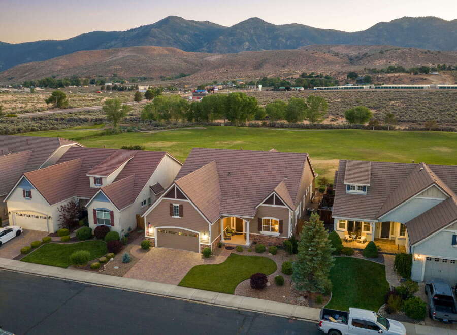 Discover modern living in this stunning suburban home, featuring a beautifully landscaped yard and a spacious driveway perfect for entertaining.