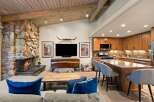 Experience rustic charm and modern convenience in this open-concept living space.