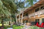 Experience mountain living in this charming property, nestled amongst mature trees and lush greenery.