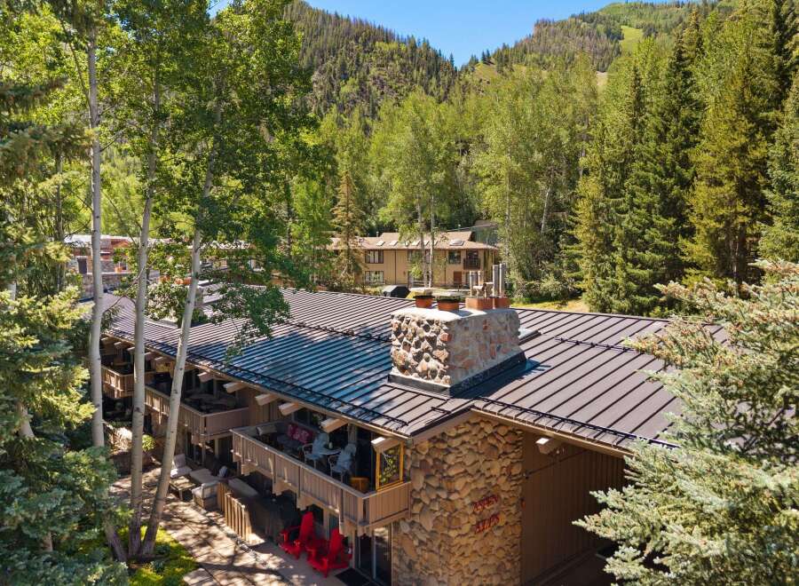 Experience mountain living at its finest with this charming property nestled amongst lush trees and rolling hills.