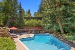 Enjoy a refreshing dip in this stunning outdoor pool, perfect for sunny days.