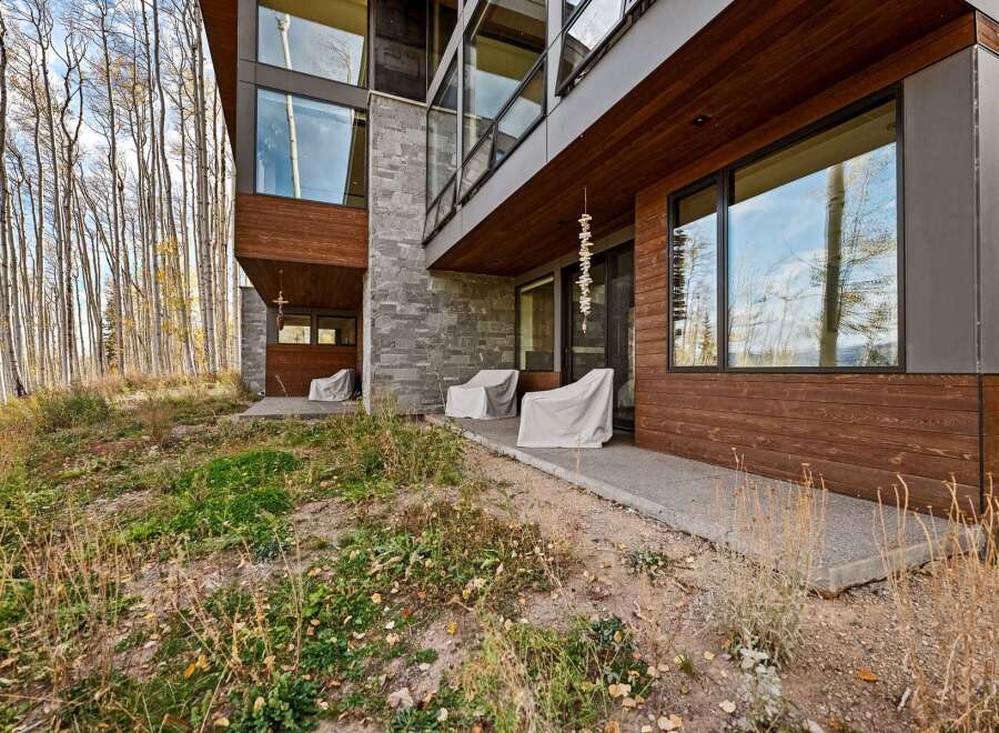 Experience modern mountain living in this stunning architectural home, nestled amongst a serene aspen grove.