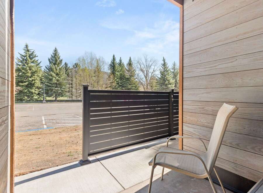 Enjoy the fresh mountain air from this private patio, perfect for morning coffee or evening relaxation.