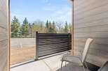 Enjoy the fresh mountain air from this private patio, perfect for morning coffee or evening relaxation.