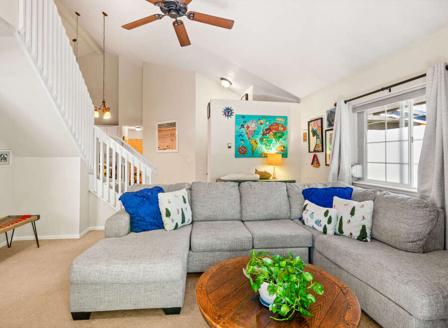 Step into this inviting living room, featuring a spacious sectional sofa perfect for family gatherings.