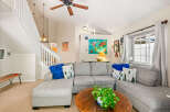 Step into this inviting living room, featuring a spacious sectional sofa perfect for family gatherings.