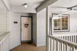 Welcome to this charming property featuring a welcoming entryway with a decorative door and a convenient doormat.