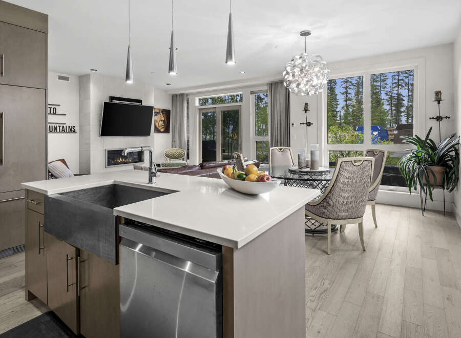 Experience modern living in this stunning open-concept kitchen and dining area.