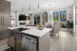 Experience modern living in this stunning open-concept kitchen and dining area.