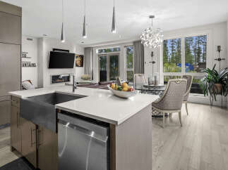 Experience modern living in this stunning open-concept kitchen and dining area.