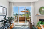 Step out onto your private balcony and enjoy breathtaking water and city views.