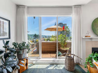 Step out onto your private balcony and enjoy breathtaking water and city views.