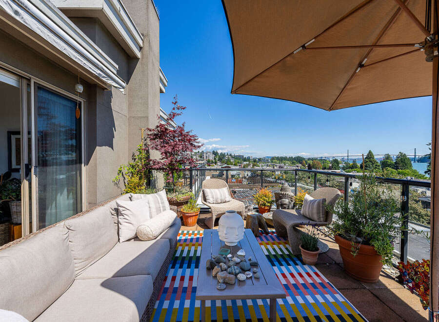 Enjoy breathtaking views from this stunning balcony, perfect for outdoor entertaining or quiet relaxation.