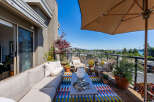 Enjoy breathtaking views from this stunning balcony, perfect for outdoor entertaining or quiet relaxation.