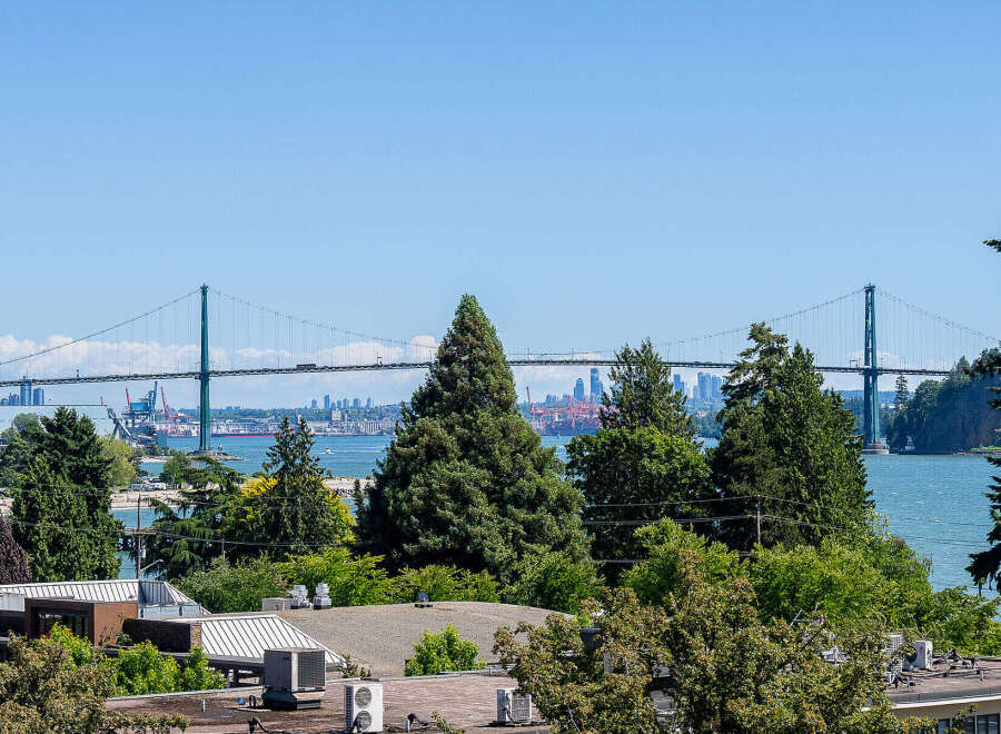 Experience breathtaking views of the Lions Gate Bridge and Vancouver's city skyline from this stunning property.