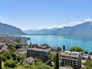 Experience breathtaking panoramic views of Lake Geneva and the majestic Alps from this stunning property.