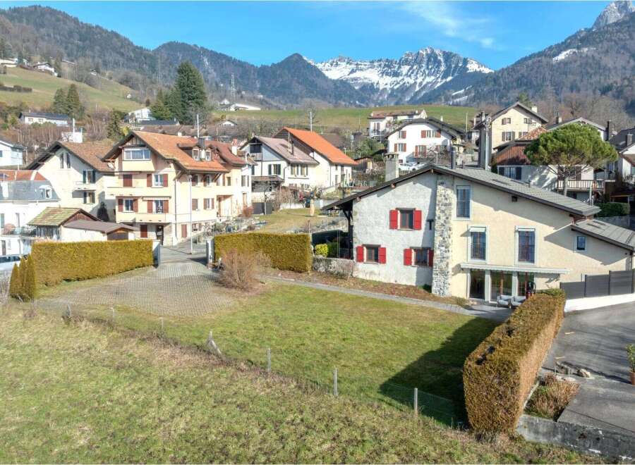 Nestled in a picturesque mountain village, this charming property offers a serene lifestyle with breathtaking views of snow-capped peaks.