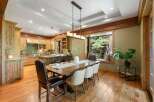 Experience rustic charm and modern convenience in this stunning kitchen and dining area.